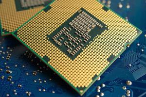 CPU, central processor unit chip Chip on circuit board in PC and laptop computer technology. photo