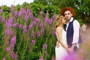 young beautiful couple in nature photo