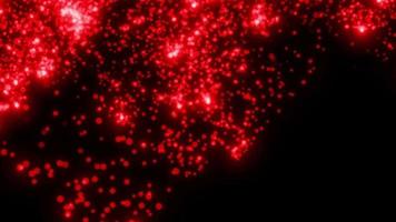 rote Partikel, die auf dem schwarzen Hintergrund leuchten. schwarzer Hintergrund mit hellen Partikeln auf dem Bildschirm. video