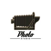 símbolo de estudio fotográfico de cámara plegable retro vector