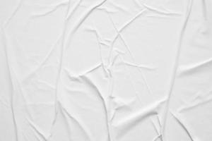 Blank white crumpled and creased paper poster texture background photo