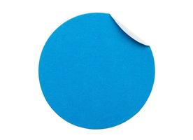 Blank blue round adhesive paper sticker label isolated on white background photo