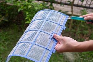 cleaning air conditioner dirty filter photo