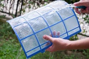 cleaning air conditioner dirty filter photo