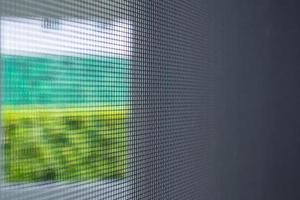 mosquito net wire screen on house window protection against insect photo