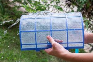 cleaning air conditioner dirty filter photo