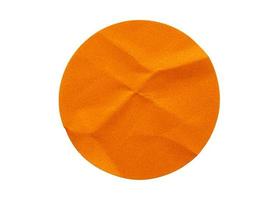 Blank orange round adhesive paper sticker label isolated on white background photo