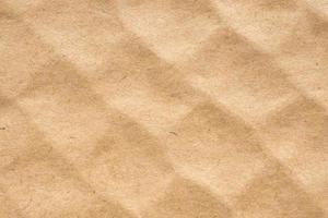 Brown eco recycled cardboard paper sheet texture background photo