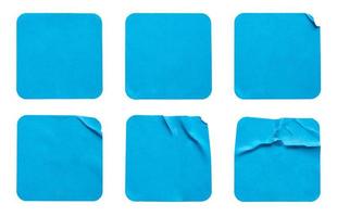 Blank blue square adhesive paper sticker label set isolated on white background photo