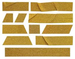 Gold glitter tape strip isolated on white background photo
