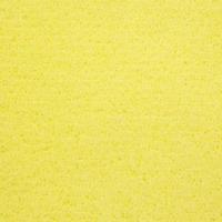 textura de goma esponja amarilla para el fondo foto