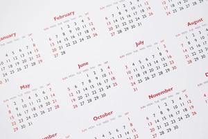 cierre las fechas de la página del calendario y el concepto de reunión de la cita de planificación empresarial de fondo del mes foto