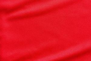 Red sports clothing fabric football shirt jersey texture background photo