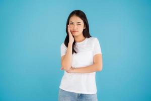 Beautiful Asian woman standing doing various poses. photo