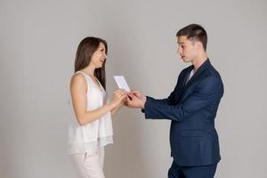 Business partners are happy to receive an important document. Man in blue suit photo