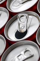 Many aluminium soda drink cans. Advertising for Soda drinks or tin cans mass manufacturing photo