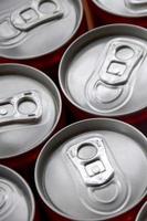 Many aluminium soda drink cans. Advertising for Soda drinks or tin cans mass manufacturing photo