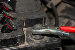 Charging a car battery. photo