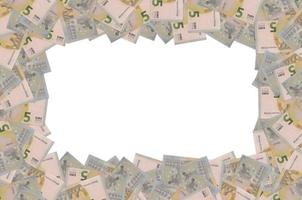 parte del patrón del primer plano del billete de 5 euros con pequeños detalles marrones foto