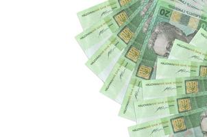 20 Ukrainian hryvnias bills lies isolated on white background with copy space. Rich life conceptual background photo