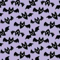 Black vampire bats on pastel purple Halloween seamless pattern. Flying smiling bats scattered on a light violet background. vector