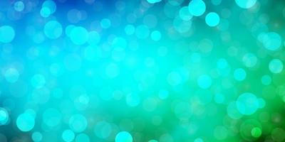 Light Blue, Green vector background with circles.