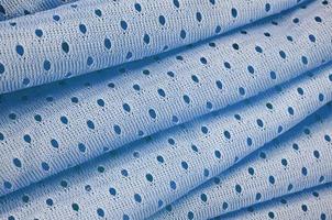 Blue mesh sport wear fabric textile background pattern photo