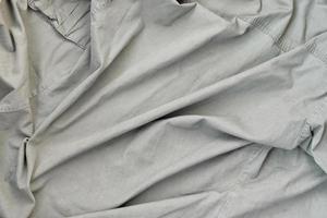 The texture of the fabric is olive-colored, which is similar to the uniform of American soldiers of the Second World War photo