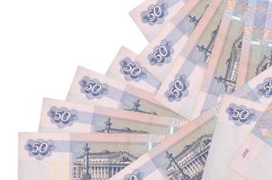 50 russian rubles bills lies in different order isolated on white. Local banking or money making concept photo