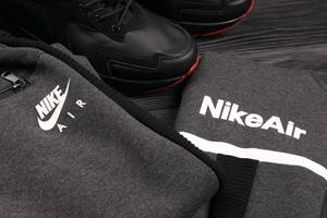 KHARKOV, UKRAINE - DECEMBER 20, 2020 Nike brand clothes and shoes sport wear kit. Nike is American multinational corporation engaged in manufacturing and worldwide marketing of clothes and footwear photo