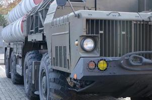 Close up of green military truck. Modern military transportation vehicle technologies photo