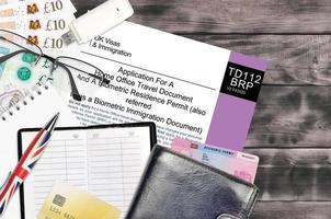 English form TD112 Application for a home office travel document and a biometric residence permit or biometric immigration document from UK visas and immigration photo