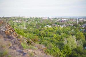a place with a rocky terrain. panoramic view from the top of a rocky mountain. Russia, Rostov region, the city of Krasny Sulin, skelevataya Gora, the 7th wonder of the world of the Don. photo
