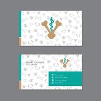 Veterinary business card with footprint and bones background vector