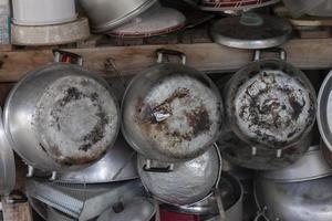 The burnt and patched pot hangs in the kitchen. photo