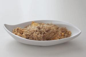 Thai fried vermicelli noodle with minced pork and egg in white plate. photo