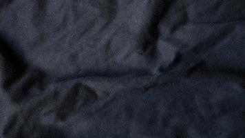 High resolution, detail shot of soft Black gray fabric background. Polyester and cotton clothing wallpaper with copy space for text. photo