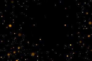 Gold glittering stars dust and bokeh background. Abstract christmas glow light texture. photo