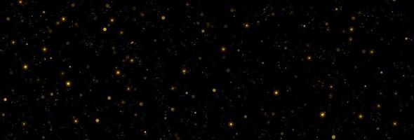 Gold glittering stars dust and bokeh background. Abstract christmas glow light texture. photo