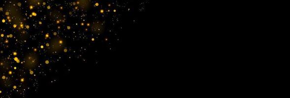 Gold glittering stars dust and bokeh background. Abstract christmas glow light texture. photo