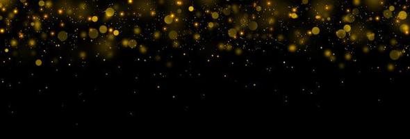 Gold glittering stars dust and bokeh background. Abstract christmas glow light texture. photo