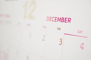 página del calendario de diciembre con meses y fechas concepto de reunión de cita de planificación empresarial foto