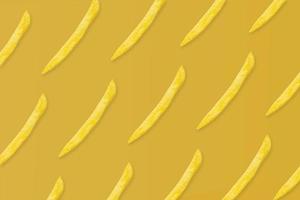 french fries pattern on yellow background top view flat lay photo