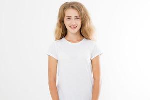 Young caucasian blonde girl isolated on white background. Copy space. Mock up. Summer woman clothes blank template white t shirt. Perfect skin. Skincare and makeup concept. photo