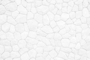 Abstract white stone wall texture background photo