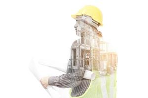 Double exposure image of professional engineer in protective helmet and blueprints paper at the house building construction site photo