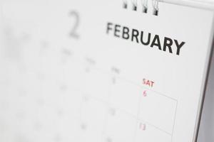 página de calendario de febrero con meses y fechas concepto de reunión de cita de planificación empresarial foto