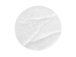 Blank white round paper sticker label isolated on white background photo