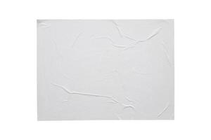 Blank white crumpled and creased paper sticker poster texture isolated on white background photo