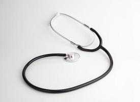 Doctor stethoscope on white background photo